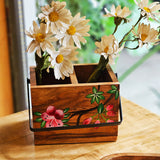 Yellow Marigold hand-painted wooden caddy in pink azalea design, adding floral charm to dining table decor with napkins and cutlery.