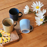 Front view of Yellow Marigold Demi Tasse Mug – Espresso Mug – Warp – Night Blue, artisan-made coffee cup in elegant deep blue tone.