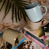 Yellow Marigold Hot Chocolate Mug styled with cocoa and marshmallows – ideal for relaxed evenings or café-style home settings.