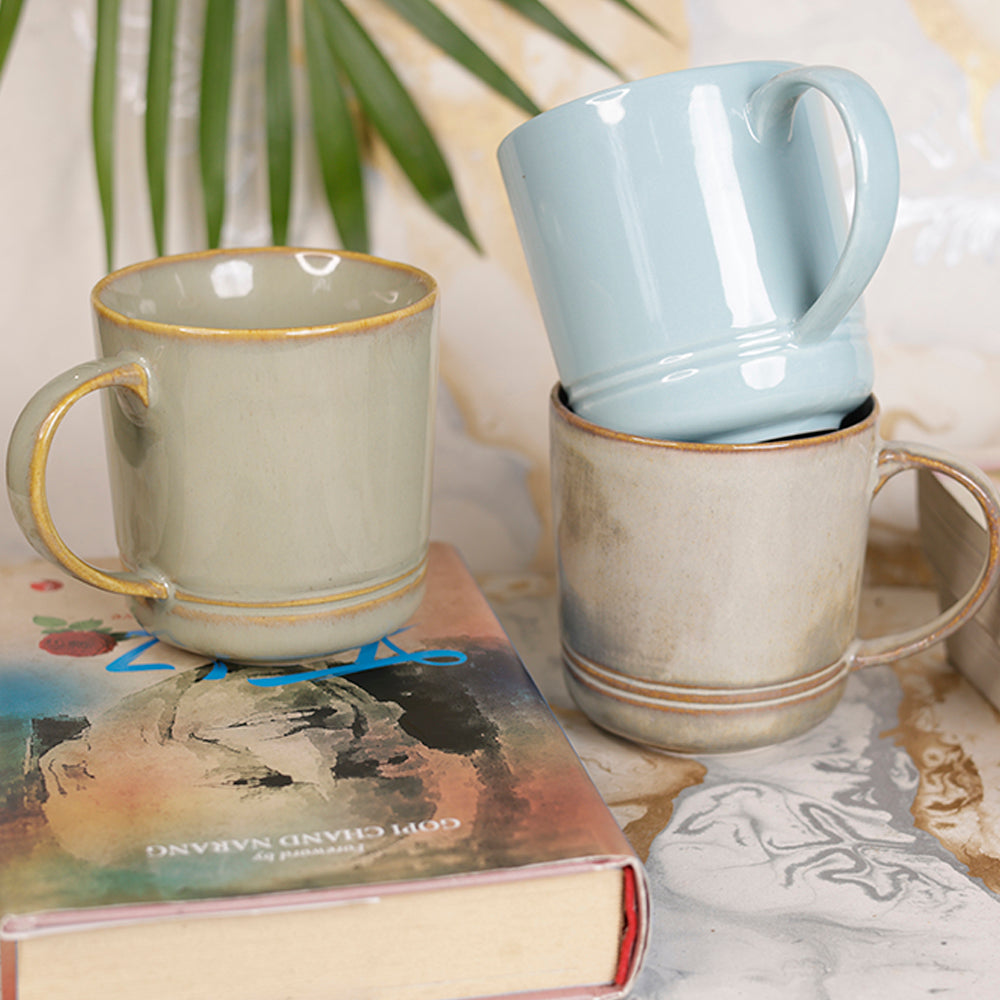 Yellow Marigold Hot Chocolate Mug – handcrafted ceramic mug with rich brown glaze, perfect for cozy winter drinks.