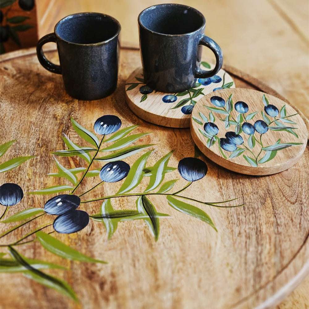 Close-up of brushwork on Yellow Marigold Handpainted Lazy Susan – Black Olives, highlighting detailed hand-painted olive design.