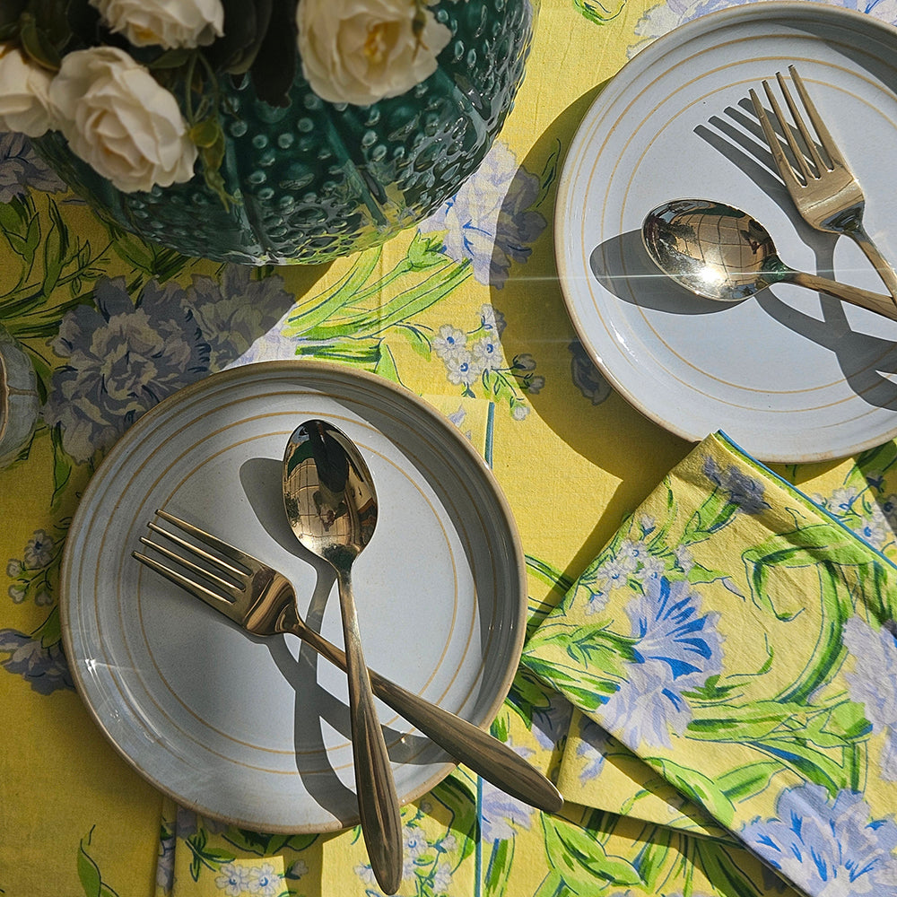 Yellow Marigold Sacha Yellow cotton napkins styled on a table – handcrafted dining linen for modern and festive table settings.