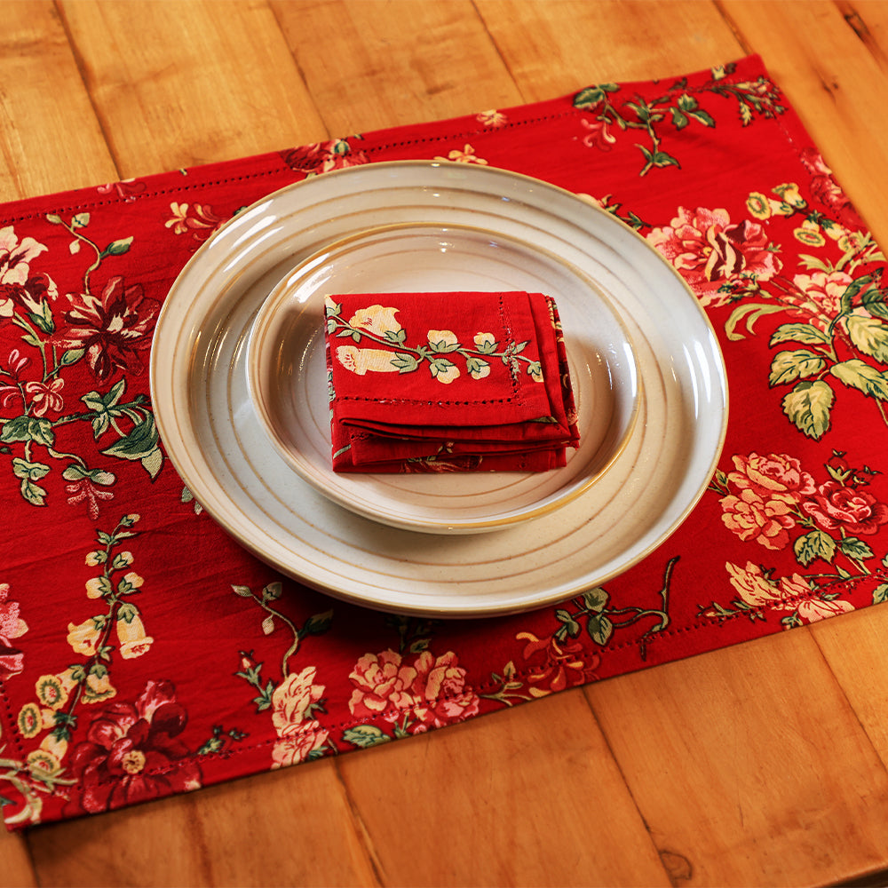 Yellow Marigold Milene Red placemat — close‑up showing cotton fabric texture with red print and stitching detail