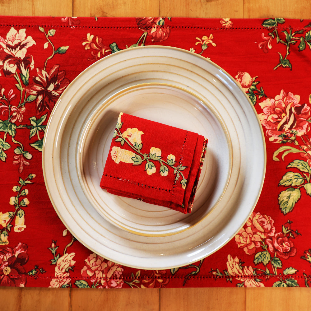 Yellow Marigold Milene Red placemats set of 6 — red cotton placemats neatly arranged on plain background