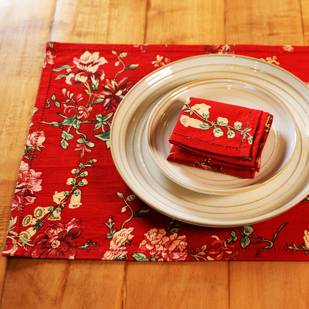 Yellow Marigold Milene Red placemats (set of 6) on a wooden dining table with crockery and décor — vibrant home dining setup