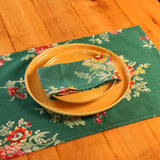 Yellow Marigold Russian Chintz Green placemats set of 6 — green floral‑print cotton placemats neatly arranged on plain background