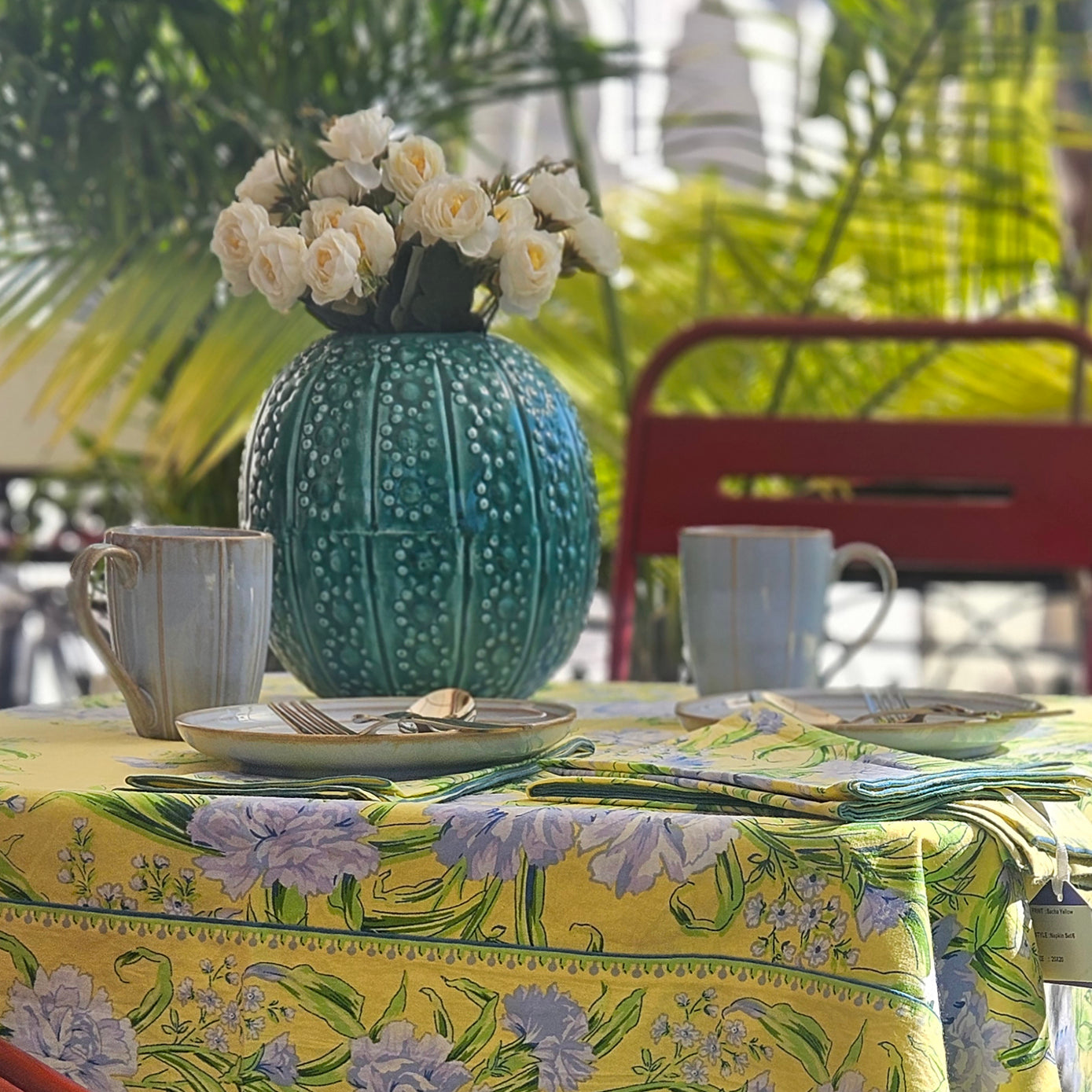 Yellow Marigold Dotted Vase – hand-painted enamel on metal vase showcasing artisanal craftsmanship and timeless detailing.