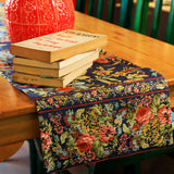 Yellow Marigold Eternal Rose Navy table runner draped over a wooden dining table with crockery and décor — elegant home dining ambience