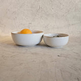 Yellow Marigold Serving Bowl – Cotton White Vintage Paris, featured in a cozy dining setup with handcrafted serveware accents.