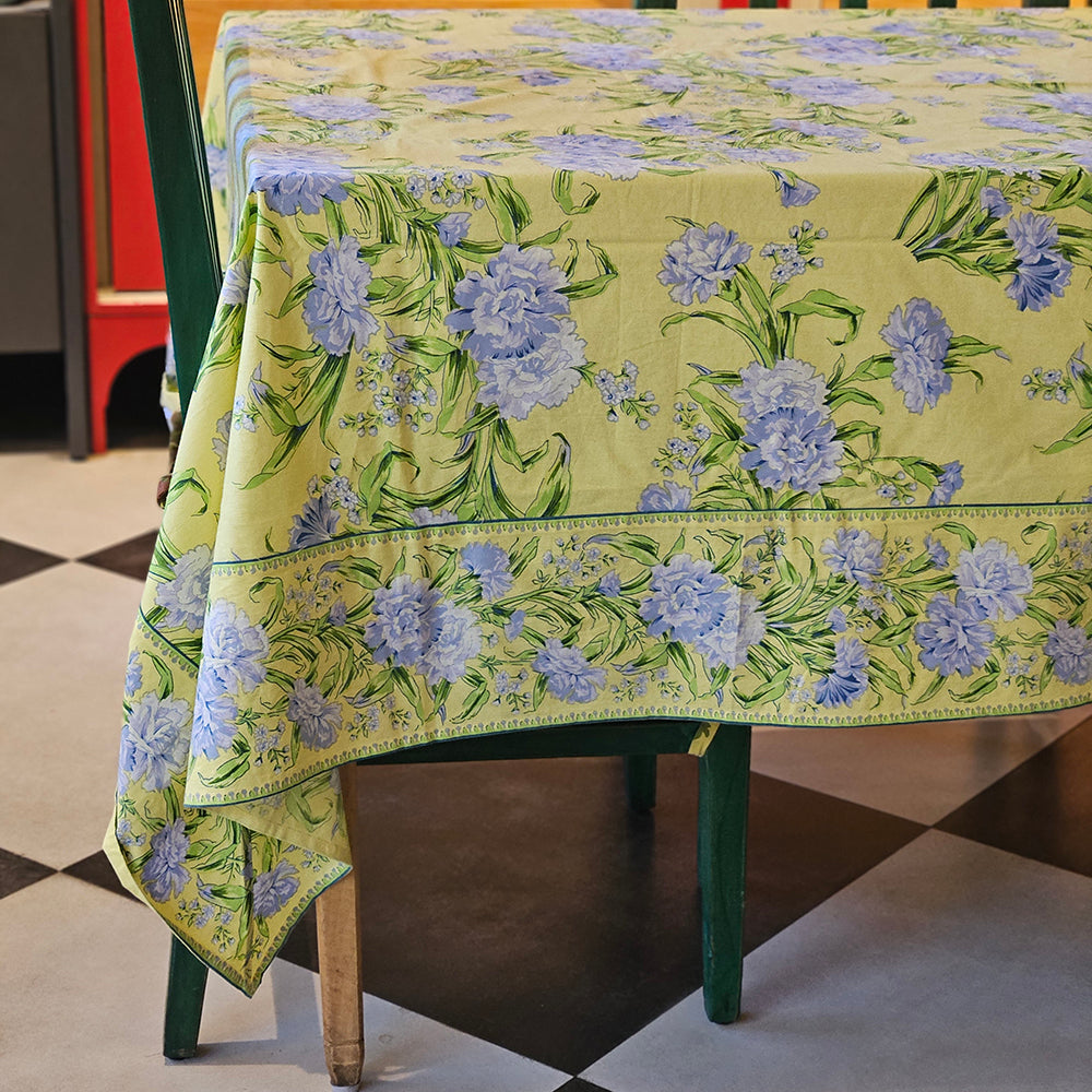 Yellow Marigold Sacha Yellow table cover, vibrant sun-yellow cotton linen with generous drape, elevating any dining room décor.