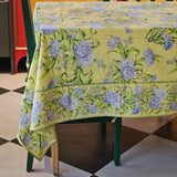 Yellow Marigold Sacha Yellow table cover, vibrant sun-yellow cotton linen with generous drape, elevating any dining room décor.