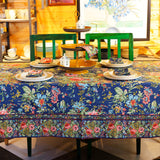 Yellow Marigold Eternal Rose Navy table cover draped over a wood dining table with crockery and décor — elegant home dining ambience