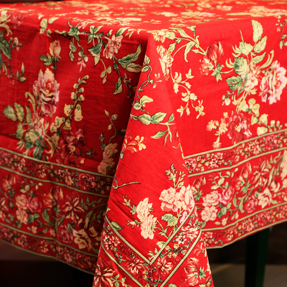 Yellow Marigold Milene Red tablecloth — close‑up showing cotton fabric texture and red floral pattern details