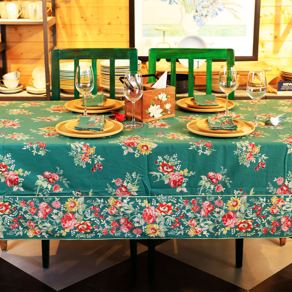 Yellow Marigold Russian Chintz Green table cover draped over a wooden dining table with crockery and décor — cozy home dining ambience