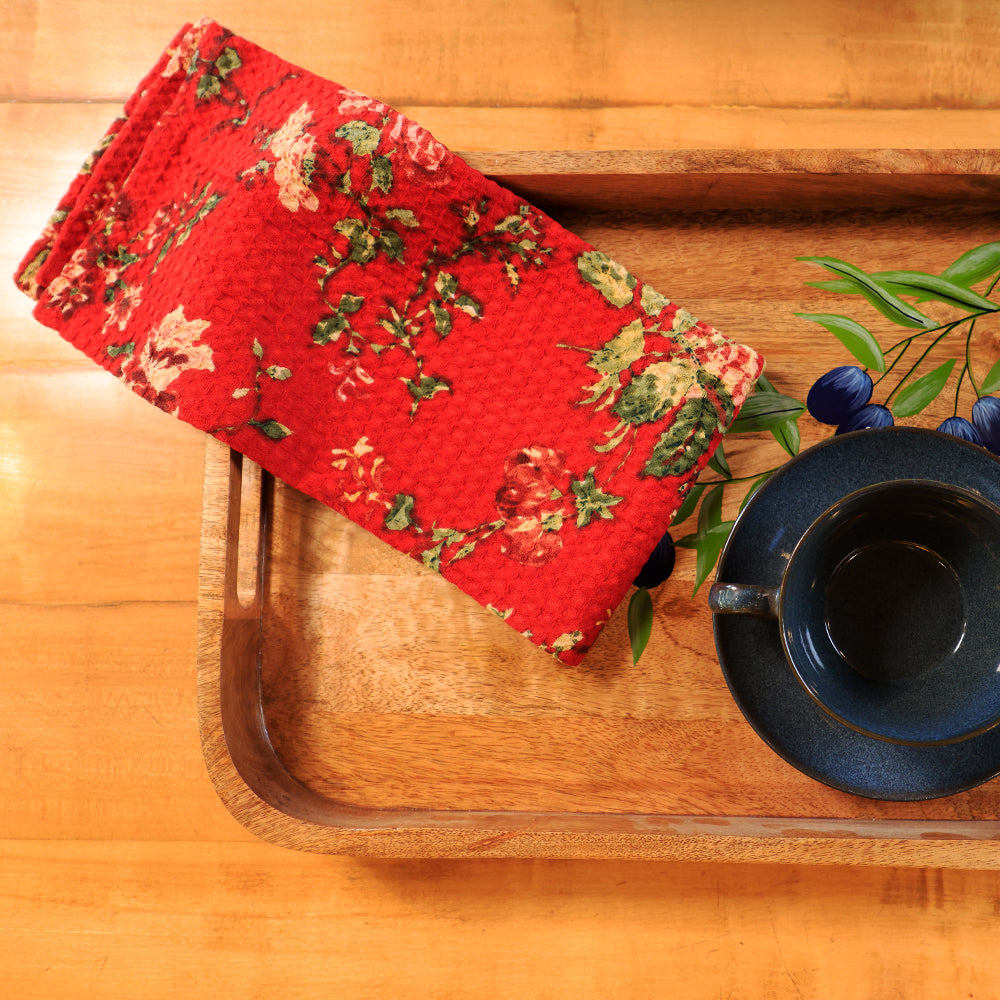Yellow Marigold Milene Red tea towel — close‑up showing cotton fabric texture and red floral/print detail