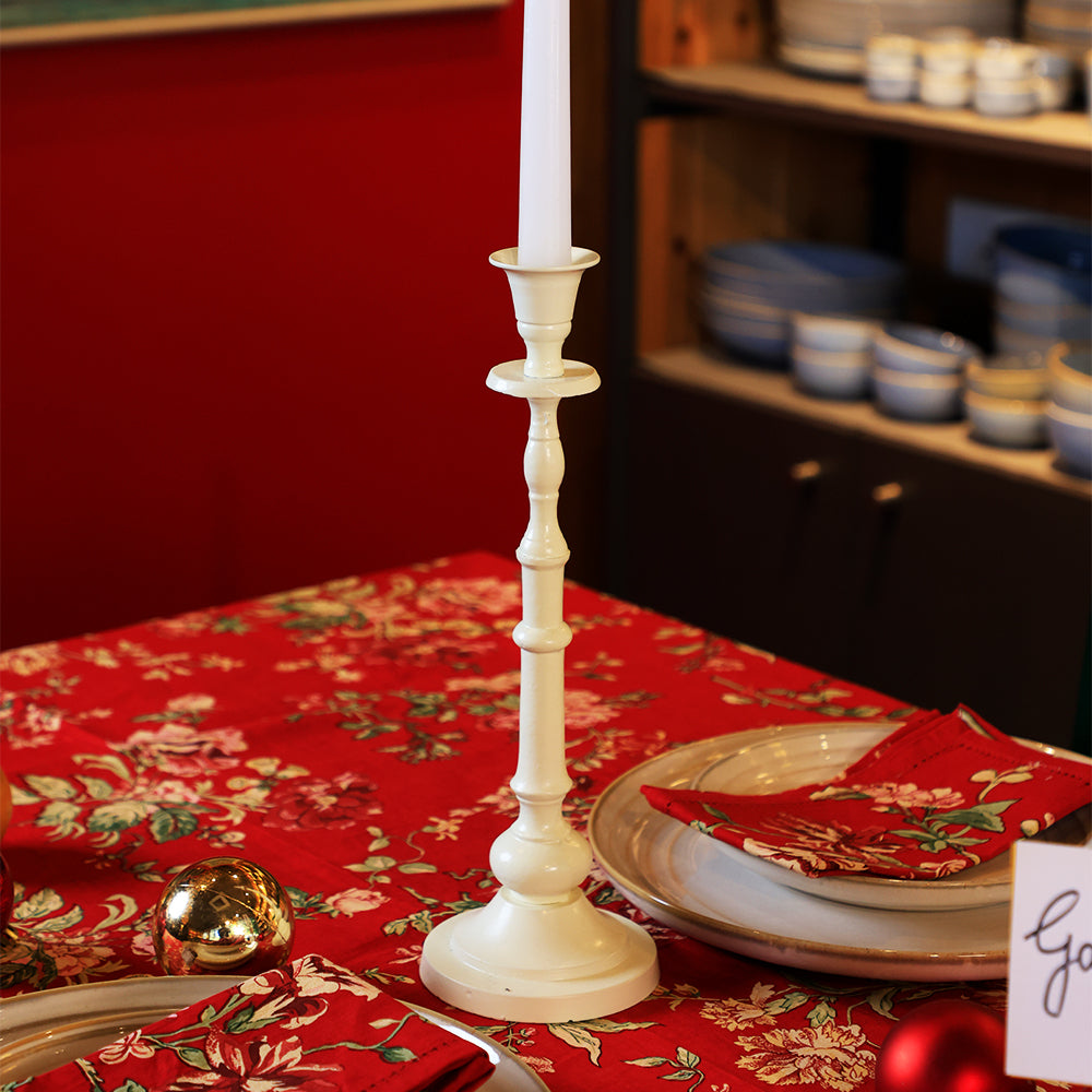 Yellow Marigold Matte Edit single‑stick metal candle holder on a wooden table with a lit candle — warm ambient lighting for cozy home décor