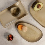 Yellow Marigold Moon White triangle platter from the Warp collection – premium porcelain, glossy stain-resistant finish, modern serve-ware for gourmet presentation.