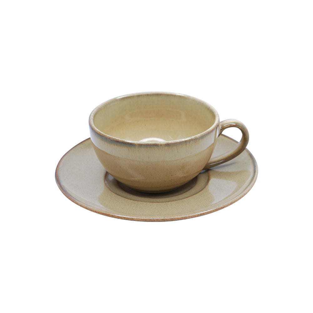 Close-up of Yellow Marigold Warp Moon White barista cup & saucer showing handcrafted porcelain texture, subtle glaze variation and refined craftsmanship.