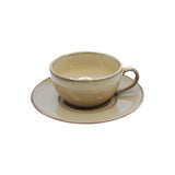 Close-up of Yellow Marigold Warp Moon White barista cup & saucer showing handcrafted porcelain texture, subtle glaze variation and refined craftsmanship.